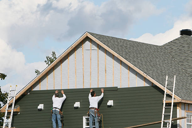 Professional Siding Replacement technician working in Marblehead, MA
